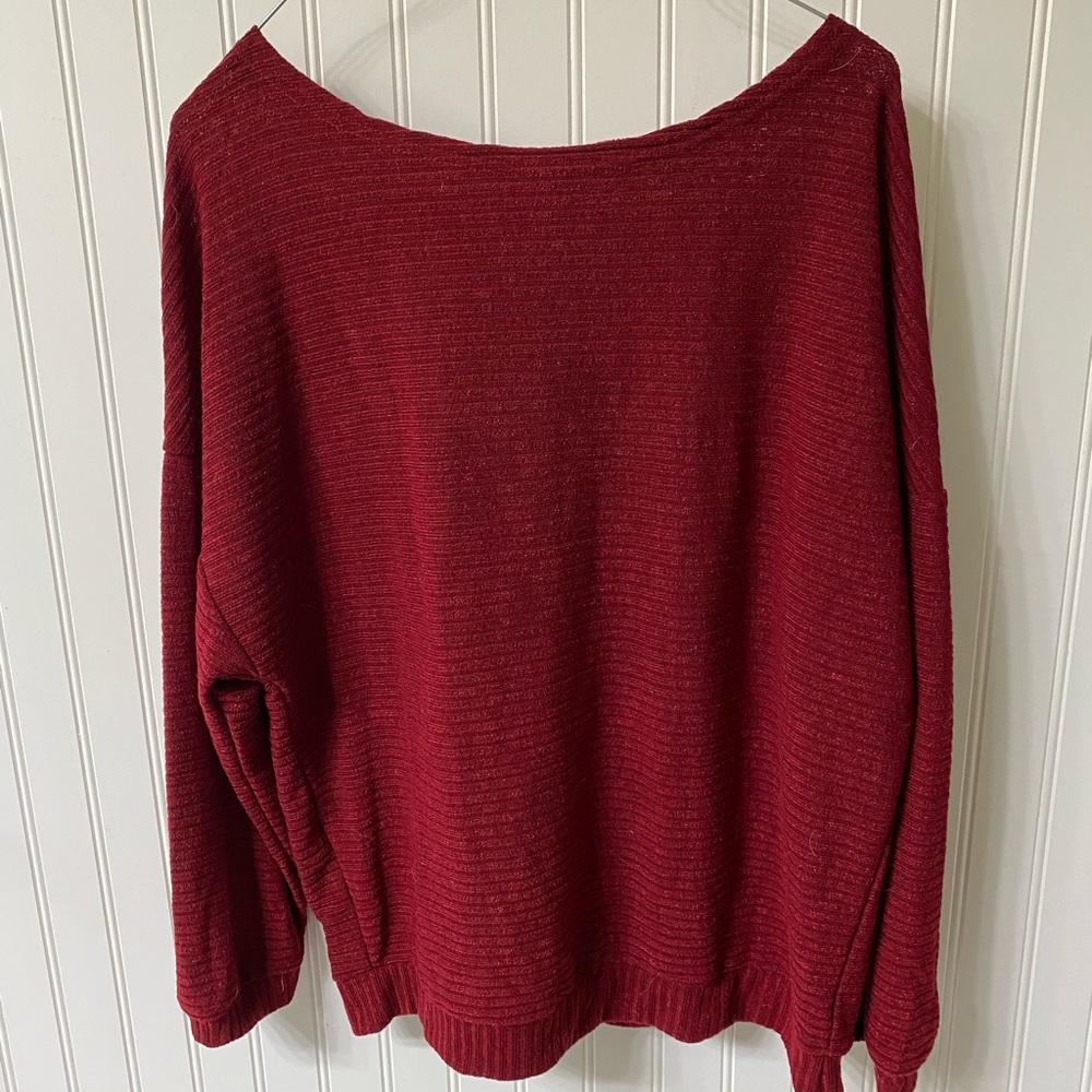 Red Long-sleeve Blouse.